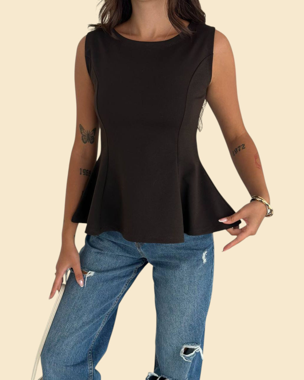 The Sleeveless Peplum Top